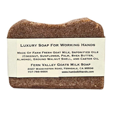 Bar of Heavy Duty Goat Milk Hand Cleaner with a label on a white background