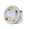 Tin container with floral design and 'Key West Candle & Bath Co' label on a white background