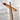 Close-up of a Wooden cross on a textured wall background