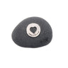 Black stone with a silver heart-shaped engraving on a white background