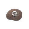 Brown stone with a pewter pendant featuring a face design on a white background