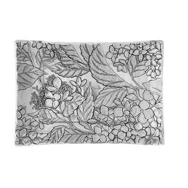 Decorative mat with black floral and leaf pattern on a white background
