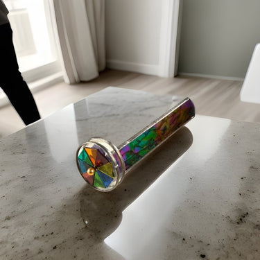 Stained Glass Kaleidoscope Black Iridescent Glass with Double Wheel sitting on table 