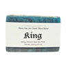 Bar of Exfoliating goat milk soap King with teakwood mahogany fragrance with a label reading 'Fern Valley Goat Milk Soap King' on a white background