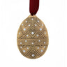 Decorative Egg ornament with geometric pattern and embedded crystals on a white background