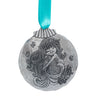 Decorative ornament with a mermaid design on a white background