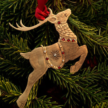 Decorative reindeer ornament on a Christmas tree