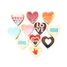 Collection of heart-shaped cookies with various designs on a white background