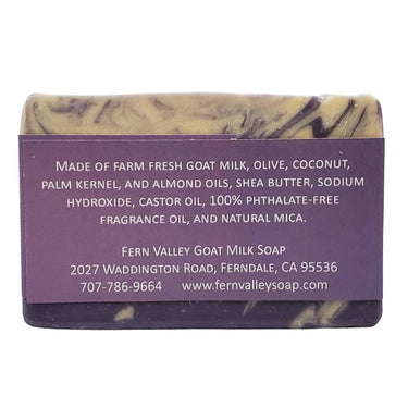 Bar of Natural Goat Milk Soap Cherish -  Floral with a purple label detailing ingredients and contact information on a white background