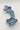 Blue ceramic sculpture on a white background