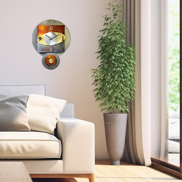 Orbit Pendulum Wall Clock displayed in home living room