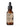 Brown glass bottle with dropper labeled 'Johnny Slicks Organic' on a white background