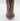 Vase with maroon and white glaze on a white background
