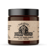 Jar of Johnny Slicks organic oil-based pomade with a black lid on a white background