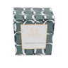 Peppermint & Eucalyptus Soy Lotion Candle packaging with a geometric pattern and a label on a white background