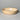 one beige ceramic bowl on a gray background