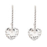 Heart-shaped earrings with engraved text on a white background