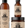 Three bottles of Johnny Slicks organic grooming products on a white background