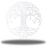 Decorative white metal tree wall art with intricate patterns on a white background