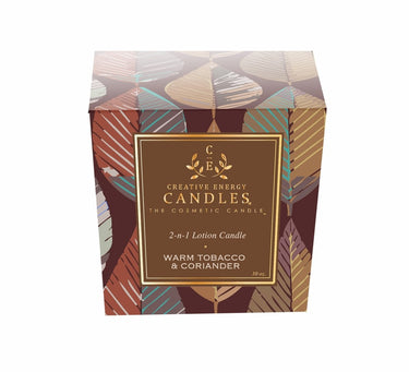 Boxed candle with leaf pattern box 'Creative Energy a Warm Tobacco & Coriander Soy Lotion Candle on a white background