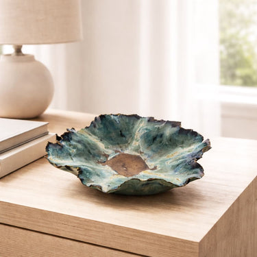 Washed Ashore Beach Bowl on a wooden surface with a lamp and books in the background